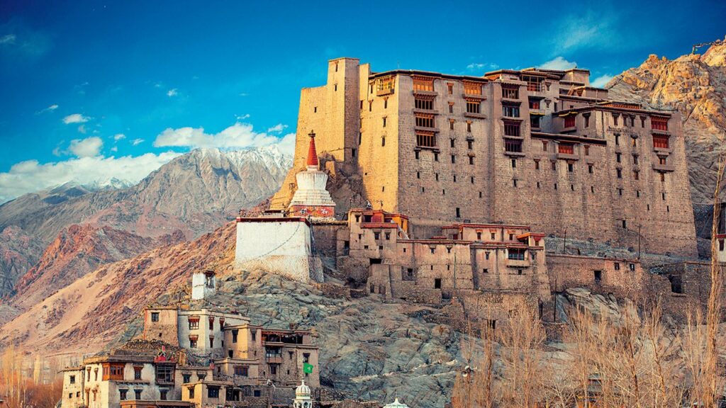 High-altitude Buddhist monastery and sweeping rugged peaks of the Ladakh Himalayas